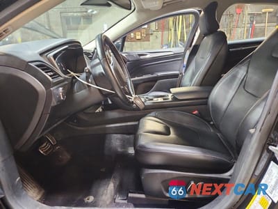 Zdjęcie 7 z 12 samochodu: 2017 FORD FUSION TITANIUM VIN:3FA6P0D97HR184093 - miniatura