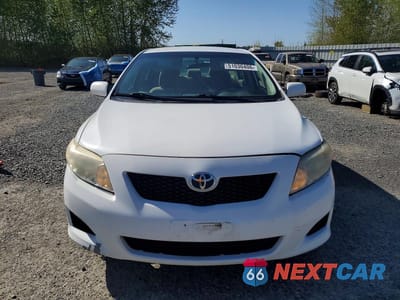 Piąte zdjęcie samochodu w środku: 2009 TOYOTA COROLLA LE VIN:JTDBL40E999089045 - miniatura