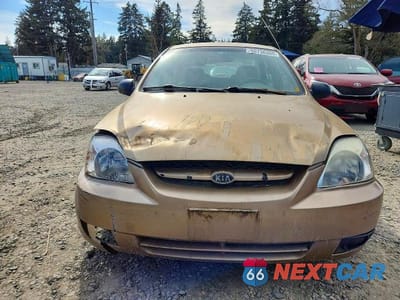 Piąte zdjęcie samochodu w środku: 2003 KIA RIO BASE VIN:KNADC125636209300 - miniatura