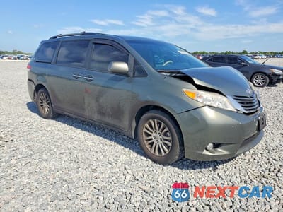 Czwarte zdjęcie samochodu z boku: 2014 TOYOTA SIENNA XLE 8-PASSENGER VIN:5TDYK3DC9ES430438 - miniatura