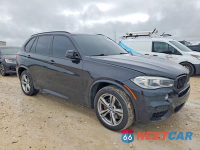 Czwarte zdjęcie samochodu z boku: 2014 BMW X5 XDRIVE50I VIN:5UXKR6C59E0J72378 - miniatura