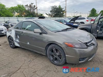 Czwarte zdjęcie samochodu z boku: 2006 HONDA CIVIC EX VIN:2HGFG12846H530637 - miniatura