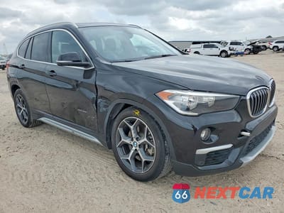 Czwarte zdjęcie samochodu z boku: 2018 BMW X1 XDRIVE28I VIN:WBXHT3C39J5K25641 - miniatura