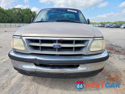 Piąte zdjęcie samochodu w środku: 1998 FORD F150 VIN:1FTZF172XWNA27933 - miniatura