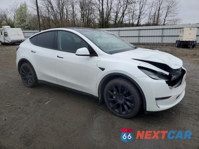 Czwarte zdjęcie samochodu z boku: 2023 TESLA MODEL Y VIN:7SAYGDEE9PA061482 - miniatura