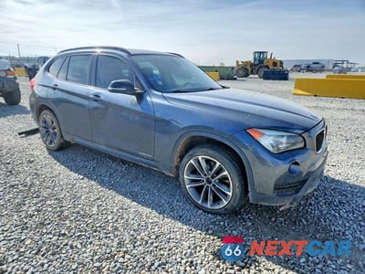 Czwarte zdjęcie samochodu z boku: 2014 BMW X1 XDRIVE28I VIN:WBAVL1C58EVY13068 - miniatura