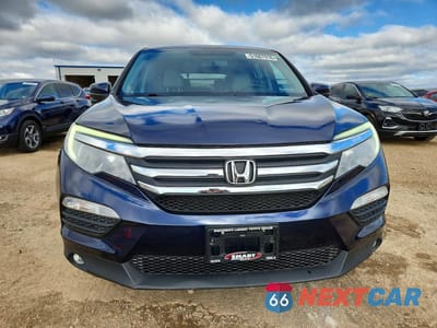 Piąte zdjęcie samochodu w środku: 2018 HONDA PILOT EXL VIN:5FNYF6H51JB042622 - miniatura