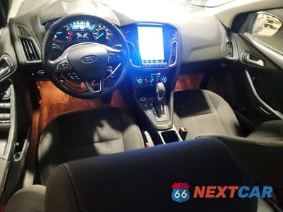 Zdjęcie 8 z 11 samochodu: 2017 FORD FOCUS SE VIN:1FADP3F29HL255561 - miniatura