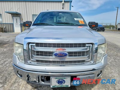 Piąte zdjęcie samochodu w środku: 2014 FORD F150 SUPERCREW VIN:1FTFW1CF0EKD01135 - miniatura