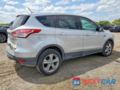 Trzecie zdjęcie samochodu z tyłu: 2014 FORD ESCAPE SE VIN:1FMCU9GX4EUD55502 - miniatura