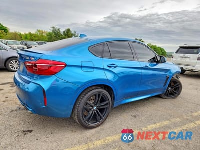 Trzecie zdjęcie samochodu z tyłu: 2018 BMW X6 M VIN:5YMKW8C50J0Y74709 - miniatura