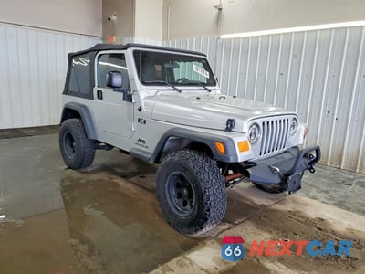 Czwarte zdjęcie samochodu z boku: 2003 JEEP WRANGLER COMMANDO/X VIN:1J4FA39SX3P374456 - miniatura