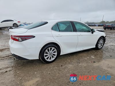 Trzecie zdjęcie samochodu z tyłu: 2022 TOYOTA CAMRY LE VIN:4T1C11AK2NU060079 - miniatura