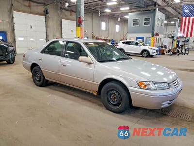 Czwarte zdjęcie samochodu z boku: 1997 TOYOTA CAMRY LE VIN:4T1BG22K9VU123211 - miniatura