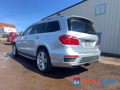 Trzecie zdjęcie samochodu z tyłu: 2013 MERCEDES-BENZ GL 550 4MATIC VIN:4JGDF7DE8DA124091 - miniatura