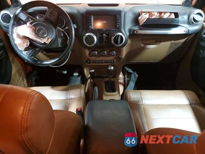 Zdjęcie 8 z 13 samochodu: 2011 JEEP WRANGLER UNLIMITED RUBICON VIN:1J4BA6H1XBL520174 - miniatura