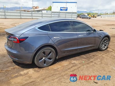 Trzecie zdjęcie samochodu z tyłu: 2020 TESLA MODEL 3 VIN:5YJ3E1EC3LF601738 - miniatura