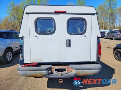 Zdjęcie 6 z 12 samochodu: 1999 FORD F250 SUPER DUTY VIN:1FTNF21L8XED31799 - miniatura