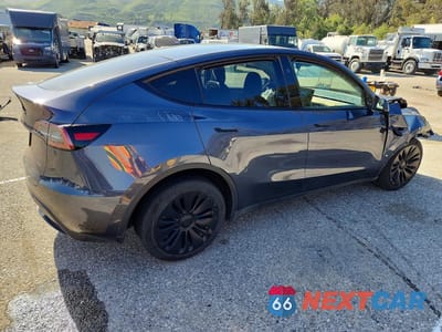 Trzecie zdjęcie samochodu z tyłu: 2024 TESLA MODEL Y VIN:7SAYGDEE0RA217198 - miniatura