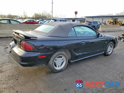 Trzecie zdjęcie samochodu z tyłu: 1997 FORD MUSTANG VIN:1FALP444XVF151502 - miniatura