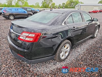 Trzecie zdjęcie samochodu z tyłu: 2017 FORD TAURUS SEL VIN:1FAHP2E8XHG116937 - miniatura