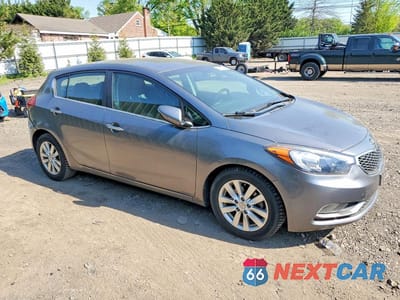 Czwarte zdjęcie samochodu z boku: 2014 KIA FORTE5 VIN:KNAFX5A81E5165280 - miniatura