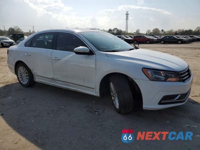 Czwarte zdjęcie samochodu z boku: 2016 VOLKSWAGEN PASSAT SE VIN:1VWBT7A32GC011623 - miniatura