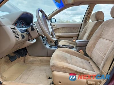 Zdjęcie 7 z 12 samochodu: 1998 NISSAN MAXIMA GXE VIN:JN1CA21DXWT607119 - miniatura