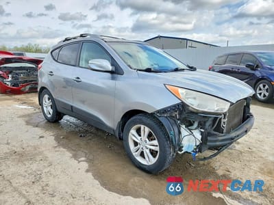 Czwarte zdjęcie samochodu z boku: 2012 HYUNDAI TUCSON GLS VIN:KM8JU3AC0CU387824 - miniatura