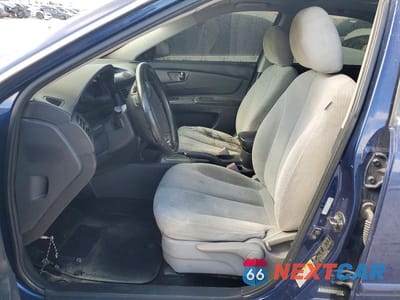 Zdjęcie 7 z 14 samochodu: 2006 KIA OPTIMA LX VIN:KNAGE123465074978 - miniatura