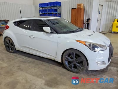 Czwarte zdjęcie samochodu z boku: 2012 HYUNDAI VELOSTER BASE VIN:KMHTC6ADXCU074303 - miniatura