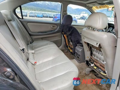 Zdjęcie 10 z 12 samochodu: 2001 NISSAN MAXIMA GXE VIN:JN1CA31A71T100201 - miniatura