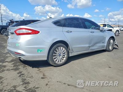 Trzecie zdjęcie samochodu z tyłu: 2016 FORD FUSION SE PHEV VIN:3FA6P0PU1GR229138 - miniatura