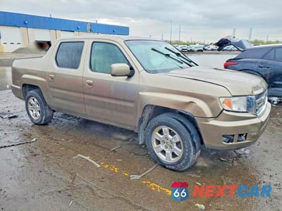 Czwarte zdjęcie samochodu z boku: 2010 HONDA RIDGELINE RTS VIN:5FPYK1F43AB010318 - miniatura