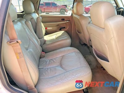 Zdjęcie 11 z 13 samochodu: 2004 GMC YUKON VIN:1GKEC13Z44R218896 - miniatura