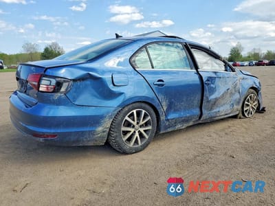 Trzecie zdjęcie samochodu z tyłu: 2017 VOLKSWAGEN JETTA SE VIN:3VWDB7AJ7HM297981 - miniatura