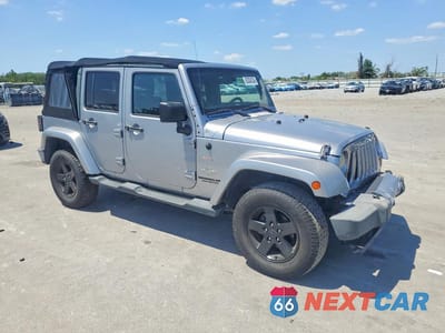 Czwarte zdjęcie samochodu z boku: 2013 JEEP WRANGLER UNLIMITED SPORT VIN:1C4HJWDG3DL591052 - miniatura