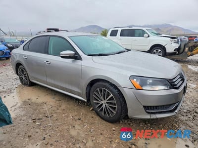 Czwarte zdjęcie samochodu z boku: 2014 VOLKSWAGEN PASSAT S VIN:1VWAT7A31EC072308 - miniatura