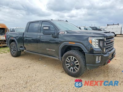 Czwarte zdjęcie samochodu z boku: 2022 GMC SIERRA K2500 AT4 VIN:1GT49PEY2NF178382 - miniatura