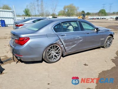 Trzecie zdjęcie samochodu z tyłu: 2013 BMW 750 LXI VIN:WBAYF8C53DD140398 - miniatura