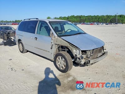 Czwarte zdjęcie samochodu z boku: 2002 HONDA ODYSSEY EX VIN:2HKRL18622H507209 - miniatura