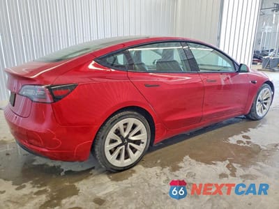 Trzecie zdjęcie samochodu z tyłu: 2023 TESLA MODEL 3 VIN:5YJ3E1EA7PF433929 - miniatura