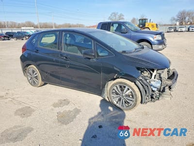 Czwarte zdjęcie samochodu z boku: 2016 HONDA FIT EX VIN:JHMGK5H77GX024755 - miniatura