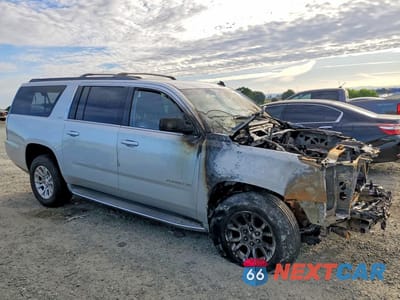 Czwarte zdjęcie samochodu z boku: 2015 GMC YUKON XL K1500 SLT VIN:1GKS2HKC4FR245191 - miniatura