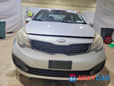 Piąte zdjęcie samochodu w środku: 2013 KIA RIO LX VIN:KNADM4A35D6238979 - miniatura