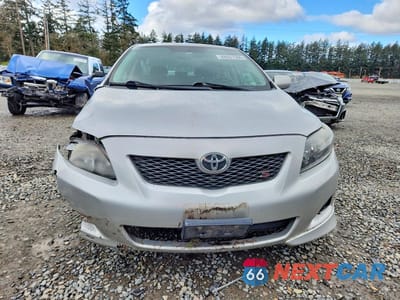 Piąte zdjęcie samochodu w środku: 2009 TOYOTA COROLLA S VIN:1NXBU40E19Z084735 - miniatura