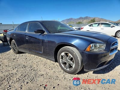 Czwarte zdjęcie samochodu z boku: 2011 DODGE CHARGER VIN:2B3CL3CGXBH556122 - miniatura