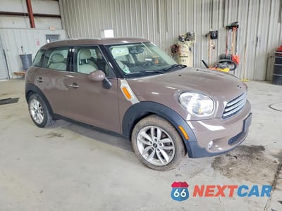 Czwarte zdjęcie samochodu z boku: 2013 MINI COOPER COUNTRYMAN VIN:WMWZB3C51DWM09408 - miniatura