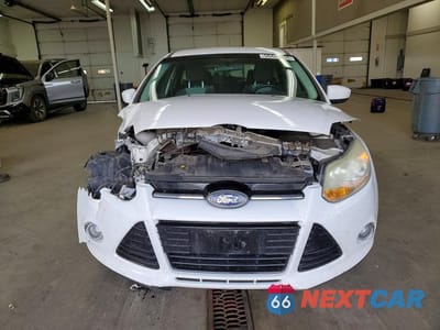 Piąte zdjęcie samochodu w środku: 2012 FORD FOCUS SE VIN:1FAHP3K28CL302871 - miniatura