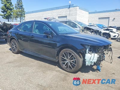 Czwarte zdjęcie samochodu z boku: 2024 TOYOTA CAMRY SE VIN:4T1G11AKXRU856263 - miniatura